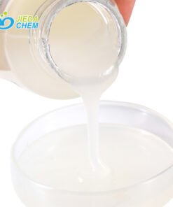 White paste Peg-40 Hydrogenated Castor Oil poured from small bottles