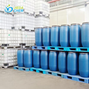 Industrial warehouse storing SLES (Sodium Laureth Sulfate) in 170kg steel drums and IBC totes, organized chemical storage