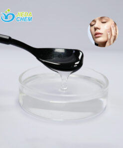 Transparent liquid Diglycerol scooped out with a small black spoon