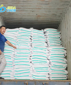 Color speckles loaded into containers for shipment