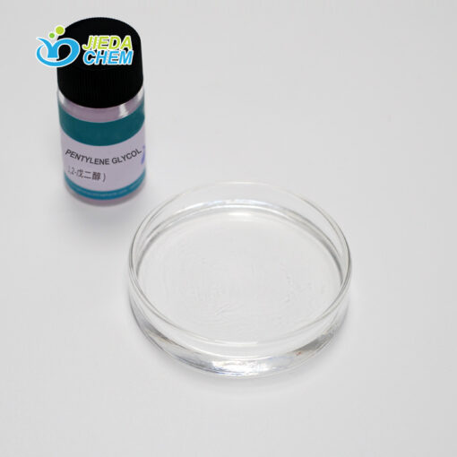 Close-up of Pentylene Glycol liquid on glass plate demonstrating viscosity and wetting properties